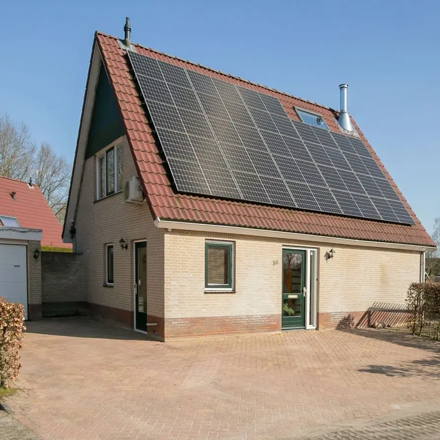 Buitenaanzicht landhuis 56 op Bungalowpark Boerhaarsveld
